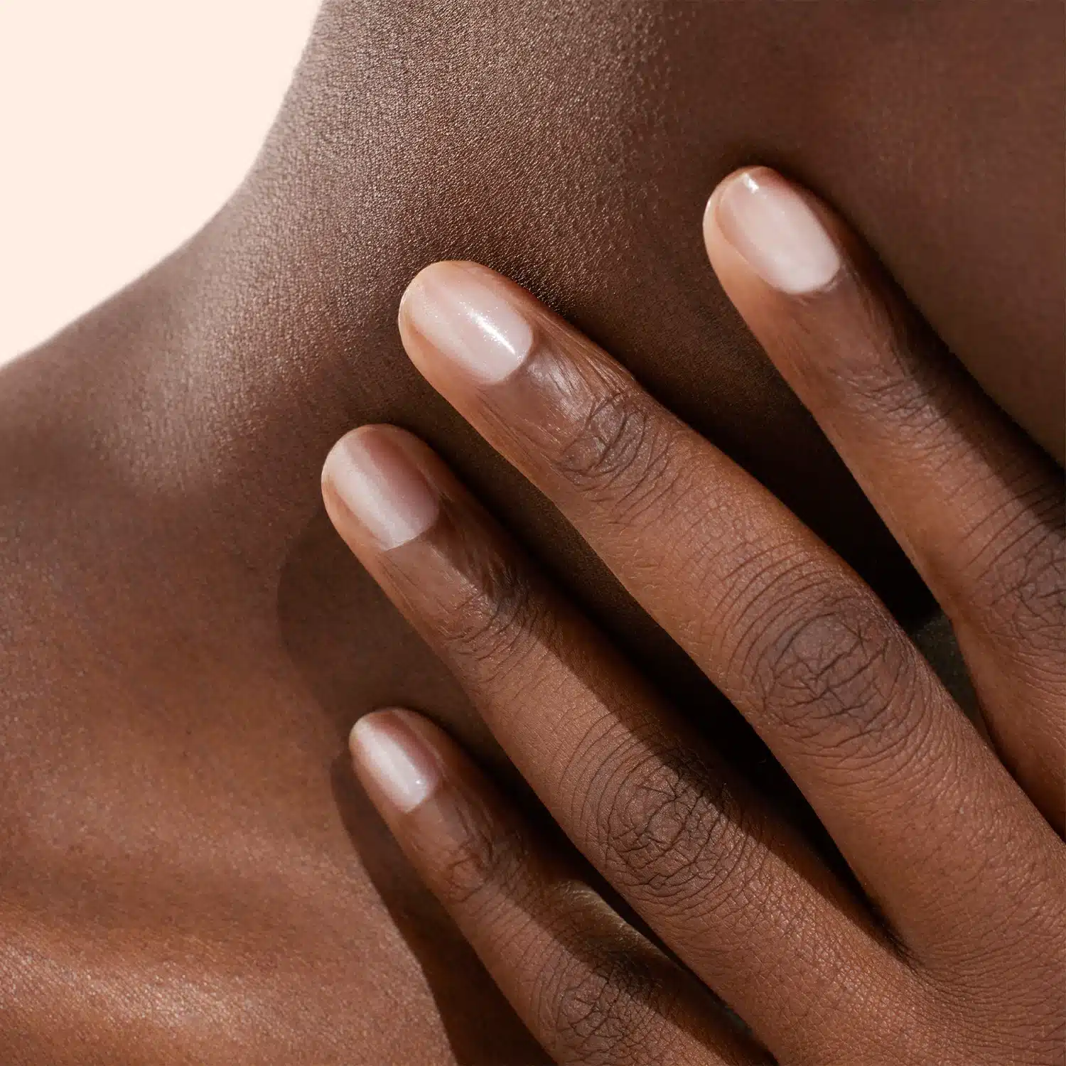 Woman with pink nail polish