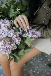 woman holding flowers