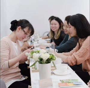 women at nail salon getting manicures