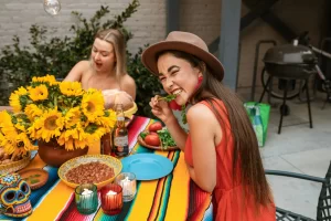 two women eating during Cinco de Mayo