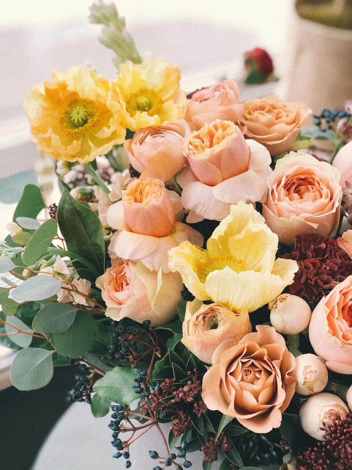 flower bouquet with roses, peonies, and tulips