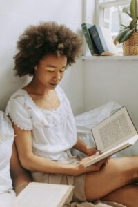 Woman reading in bed